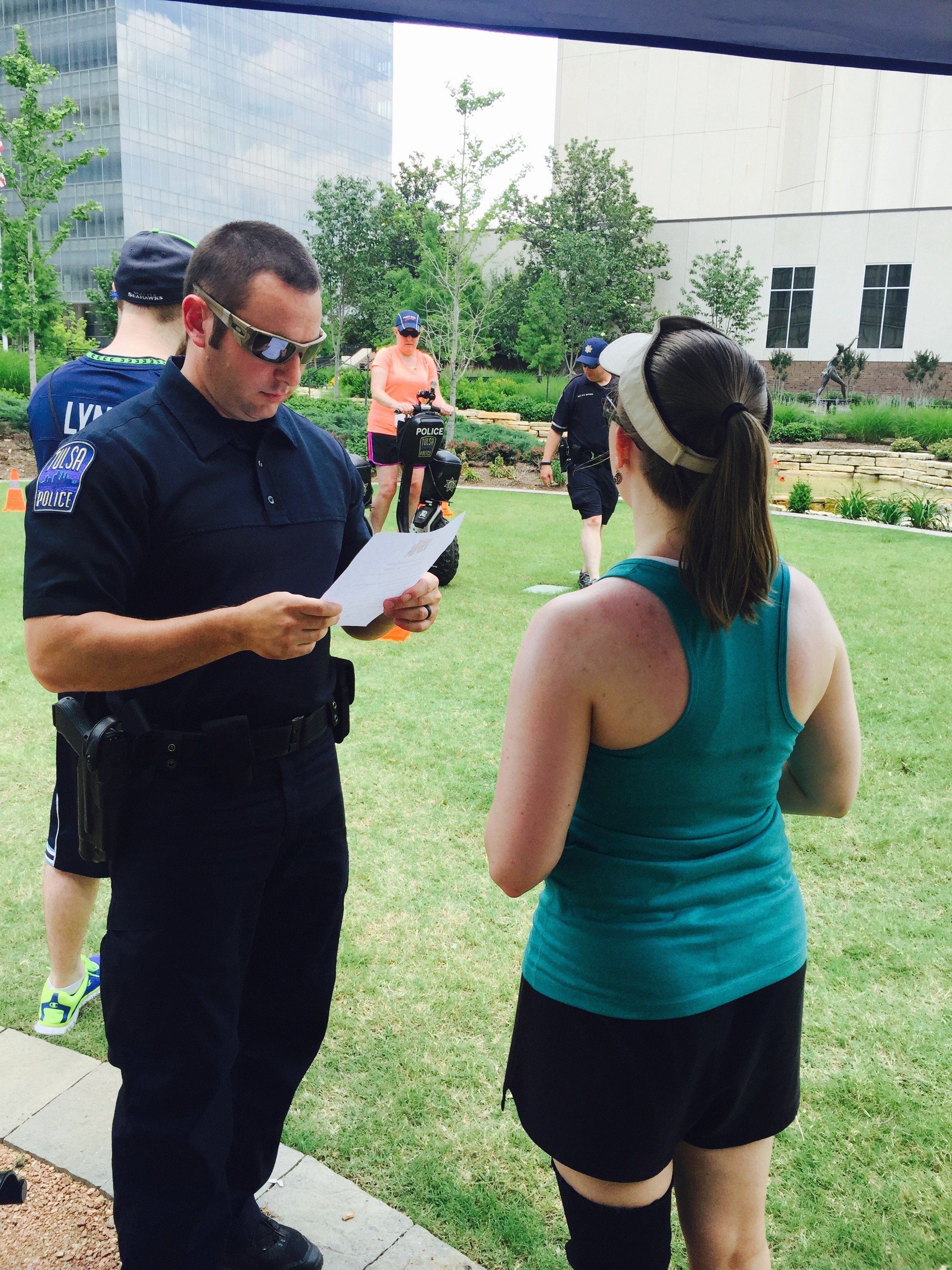 Ashley Reciting Miranda Rights to Police Officer